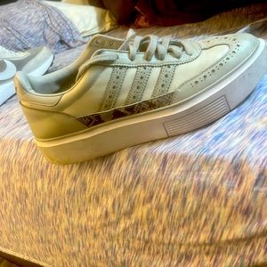 Adidas size 10. Have been used but still in good condition